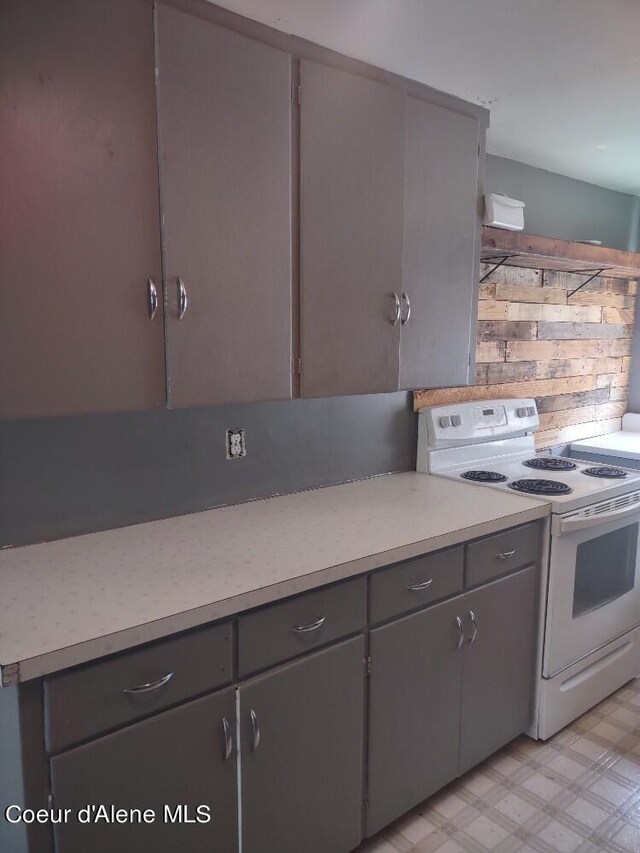 kitchen featuring white electric stove