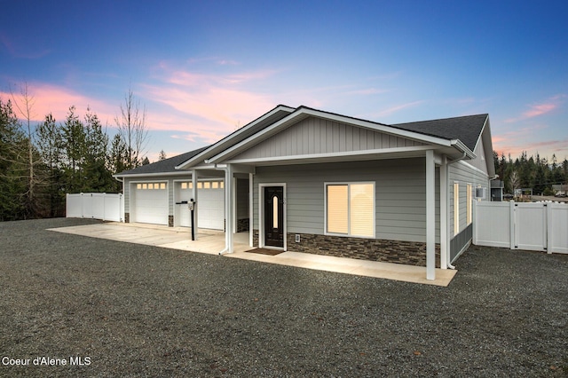 view of front of property featuring a garage