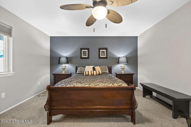 bedroom featuring ceiling fan and light colored carpet