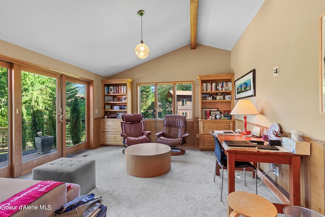 carpeted office space featuring a healthy amount of sunlight and lofted ceiling with beams