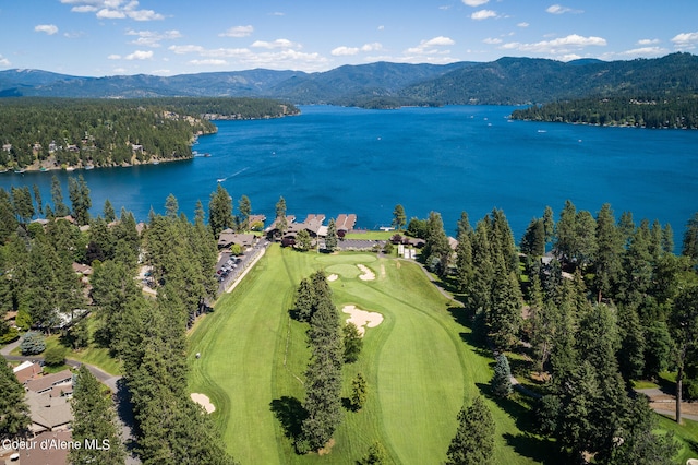 aerial view featuring a water and mountain view