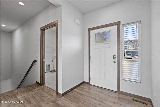 entrance foyer with light hardwood / wood-style flooring