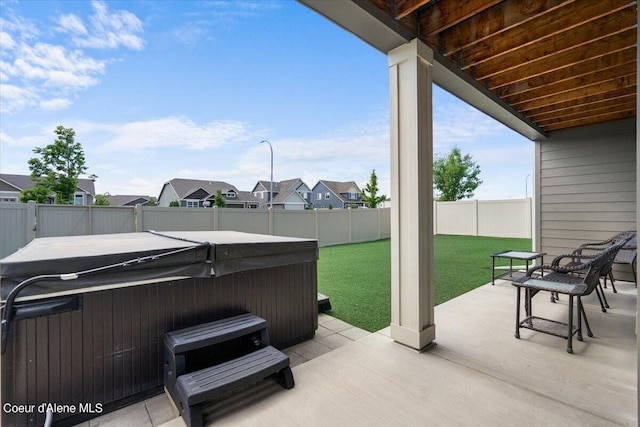 view of patio featuring a hot tub