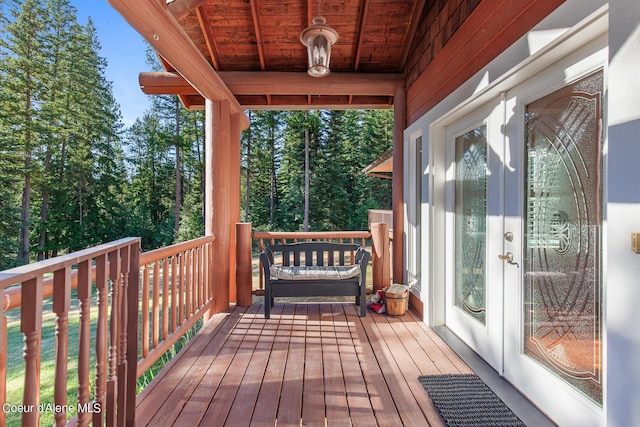 wooden terrace featuring french doors