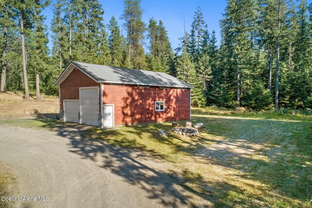 view of outdoor structure featuring a garage