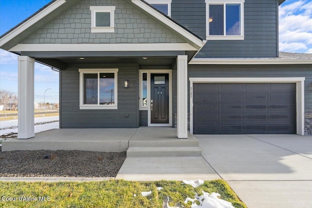 craftsman inspired home with a garage