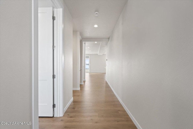 corridor featuring light wood-type flooring