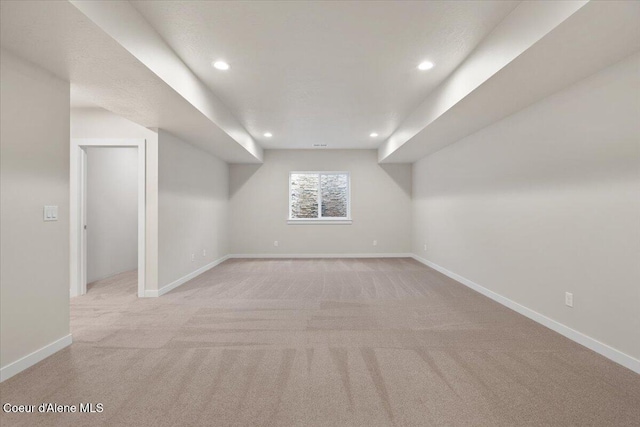 additional living space with light carpet