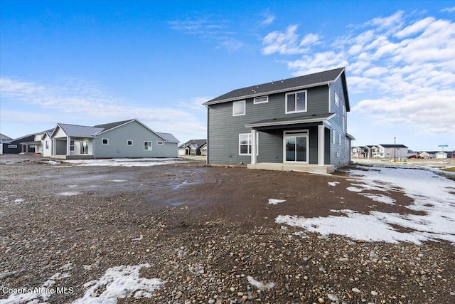 rear view of property with a patio area