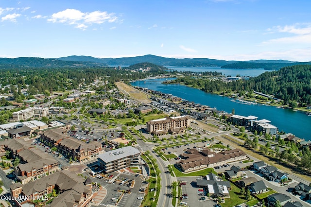 bird's eye view with a water and mountain view