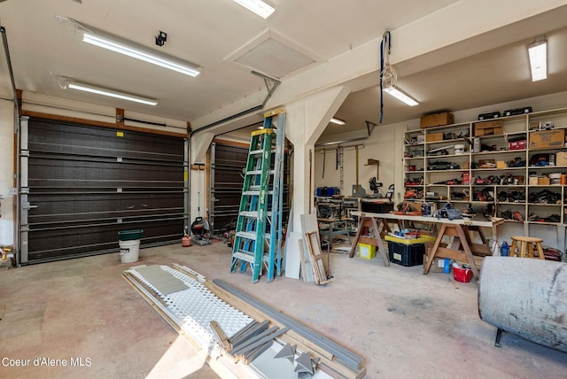 garage featuring a workshop area