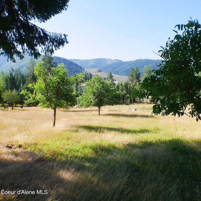 view of mountain feature with a rural view