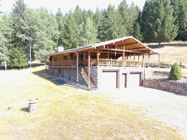 view of log-style house