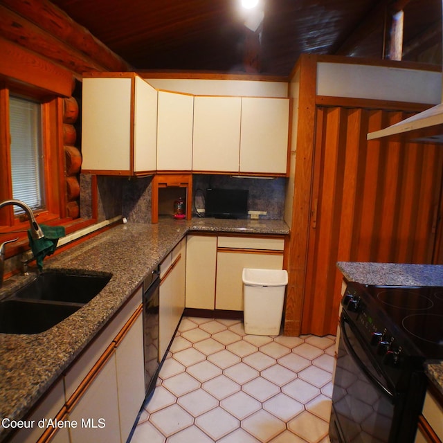 kitchen with stone counters, white cabinetry, sink, black electric range oven, and backsplash