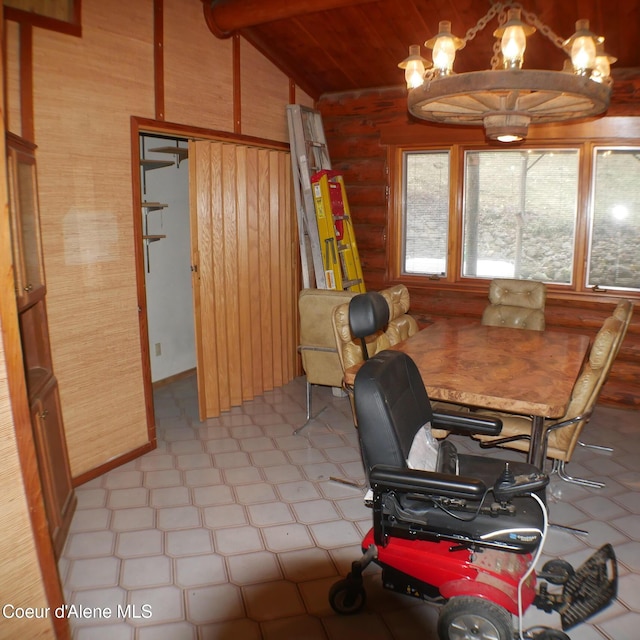 dining space featuring wooden ceiling, vaulted ceiling, and wooden walls