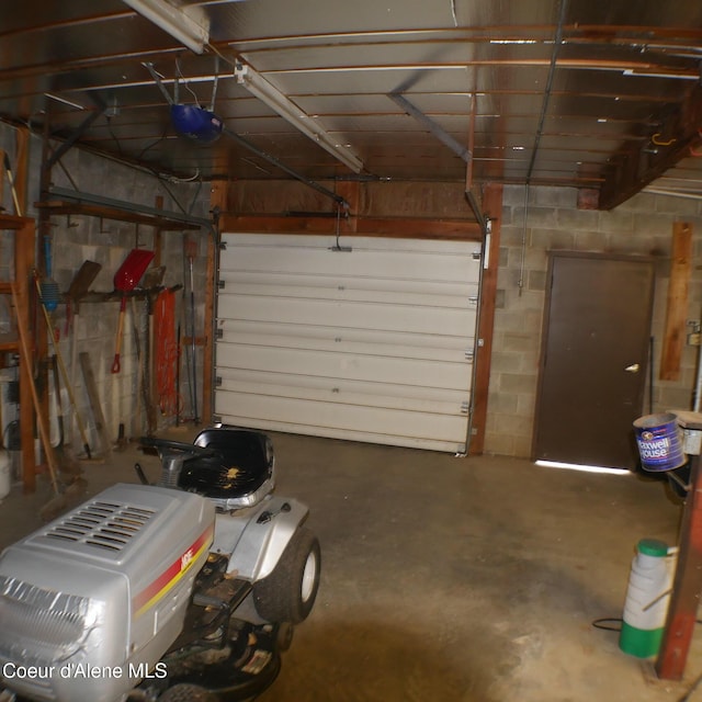 garage featuring a garage door opener