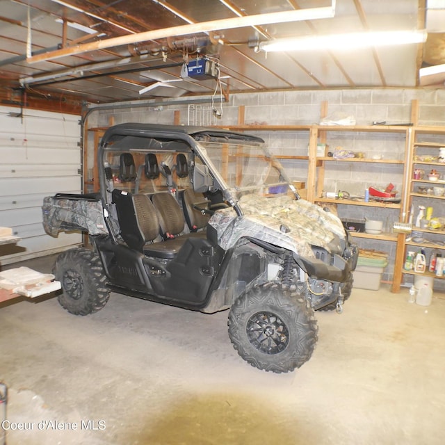 garage featuring a garage door opener