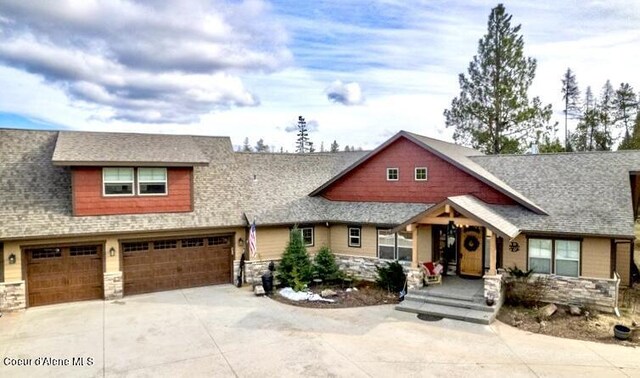 craftsman inspired home featuring a garage