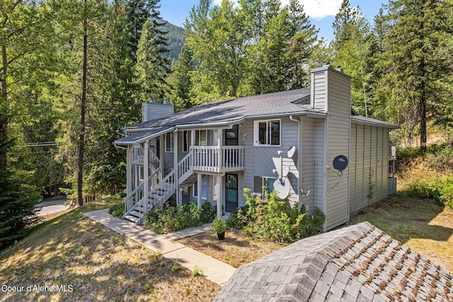 view of front of house with a sunroom