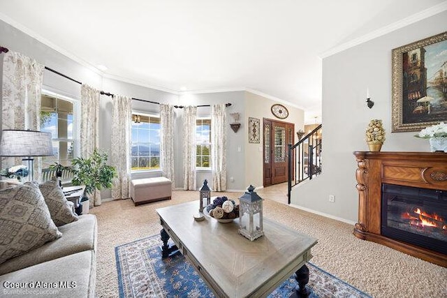 living room featuring ornamental molding, stairway, carpet floors, and baseboards