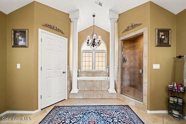 foyer entrance featuring visible vents, baseboards, light tile patterned flooring, decorative columns, and a notable chandelier