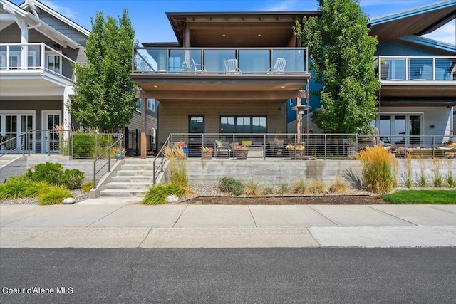 view of front of house with a balcony