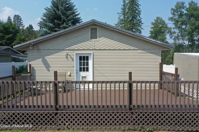 rear view of house with a deck