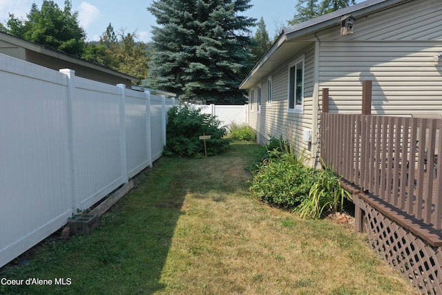 view of yard featuring a fenced backyard