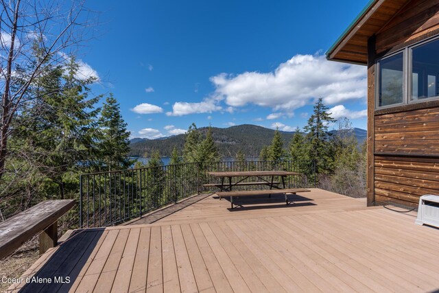 wooden terrace with a mountain view