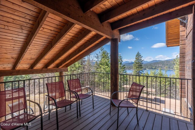 deck featuring a water and mountain view