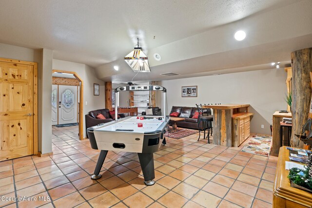 playroom with light tile patterned floors