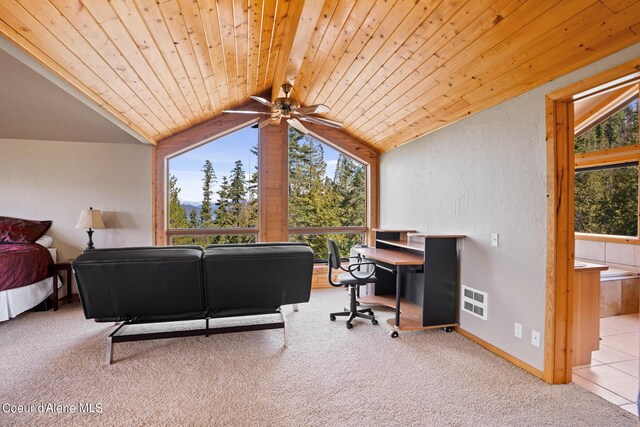 carpeted bedroom featuring lofted ceiling with beams and wooden ceiling