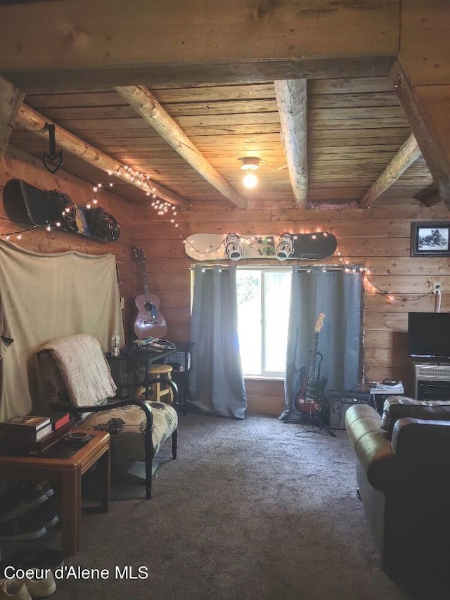 sitting room with wood ceiling, carpet floors, and beam ceiling