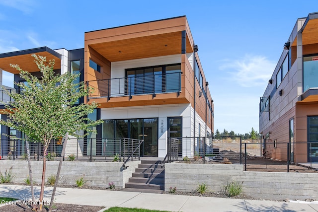 contemporary house featuring a balcony