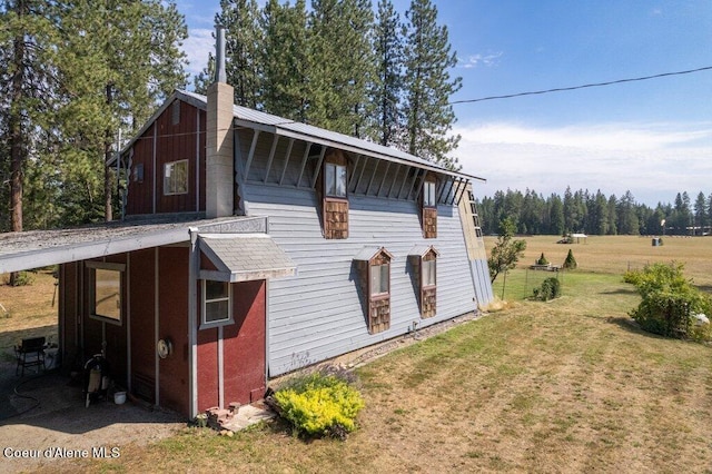view of property exterior featuring a yard