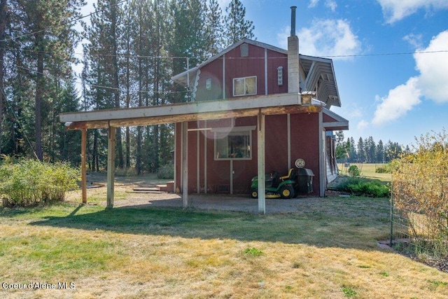 exterior space featuring a lawn