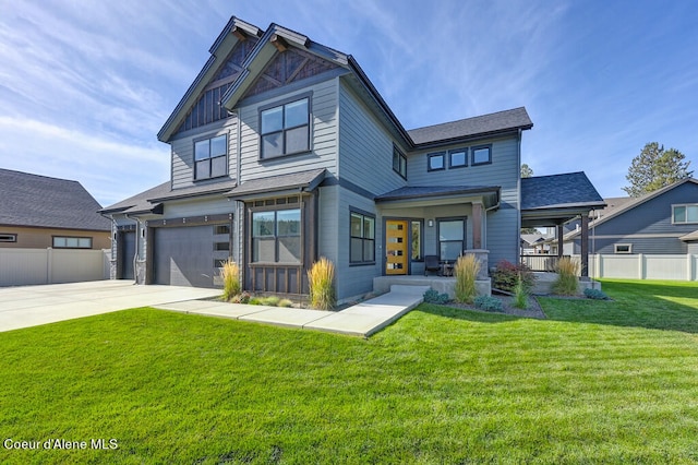 view of front facade with a front lawn, a porch, and a garage