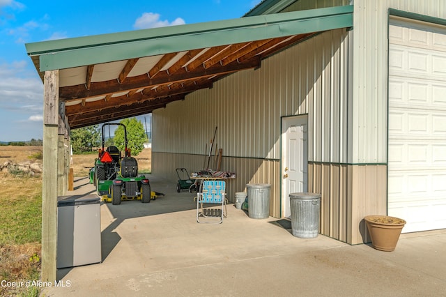 view of patio with a garage