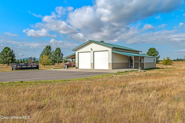 garage featuring a carport