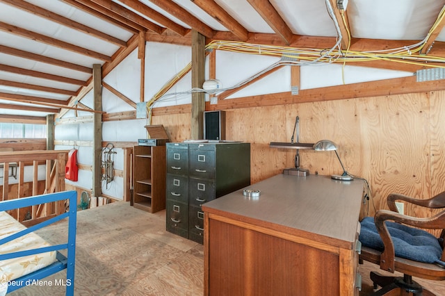 interior space featuring vaulted ceiling with beams