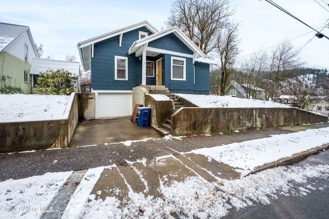 view of front of property featuring a garage