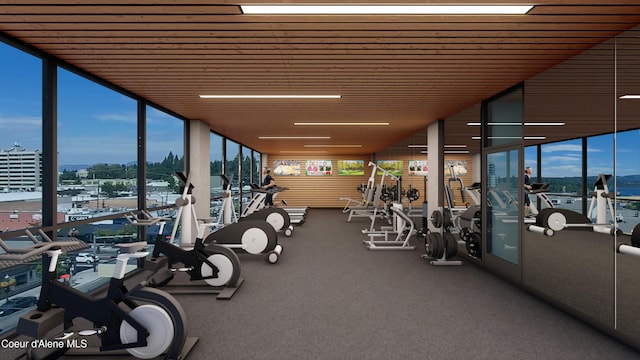 gym with a city view and floor to ceiling windows