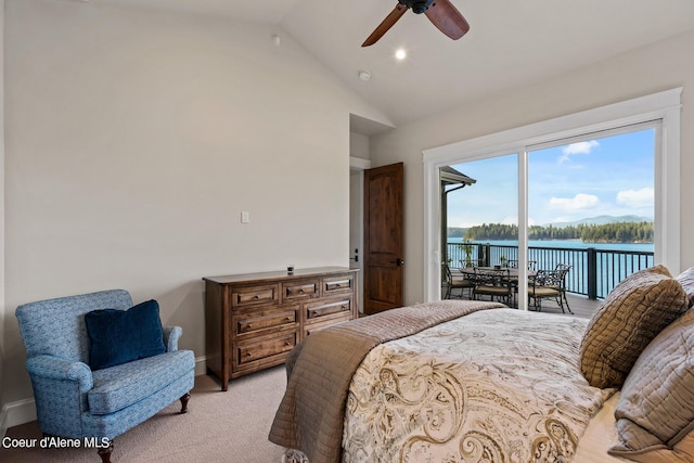 8491 N Mckinley Ln, Hayden, ID 83835 - bedroom featuring lofted ceiling, a water view, access to exterior, a ceiling fan, and light carpet