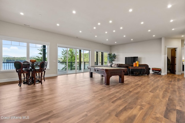 8491 N Mckinley Ln, Hayden, ID 83835 - playroom with wood finished floors, pool table, and recessed lighting