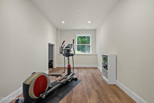 8491 N Mckinley Ln, Hayden, ID 83835 - workout area featuring baseboards, wood finished floors, and recessed lighting