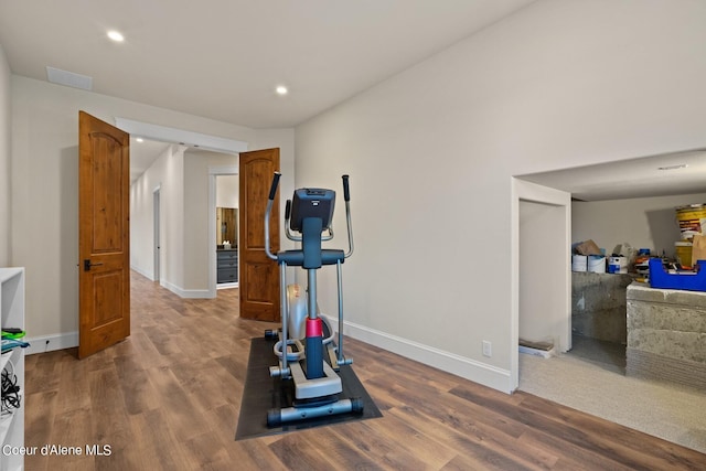 8491 N Mckinley Ln, Hayden, ID 83835 - exercise area featuring baseboards, visible vents, wood finished floors, and recessed lighting