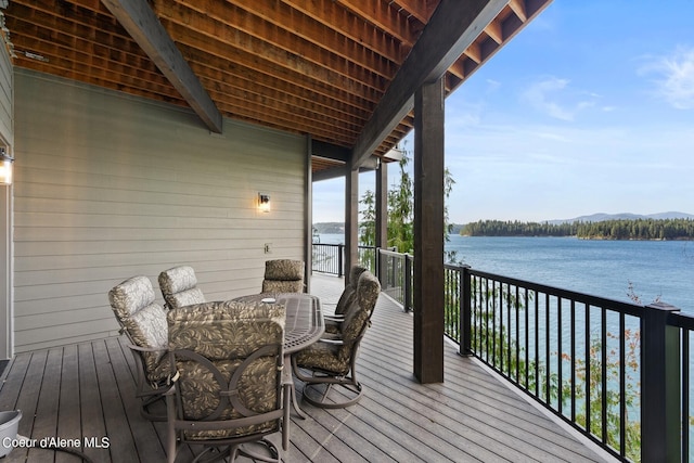 8491 N Mckinley Ln, Hayden, ID 83835 - wooden terrace with a water view