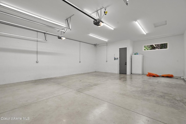 8491 N Mckinley Ln, Hayden, ID 83835 - garage with a garage door opener
