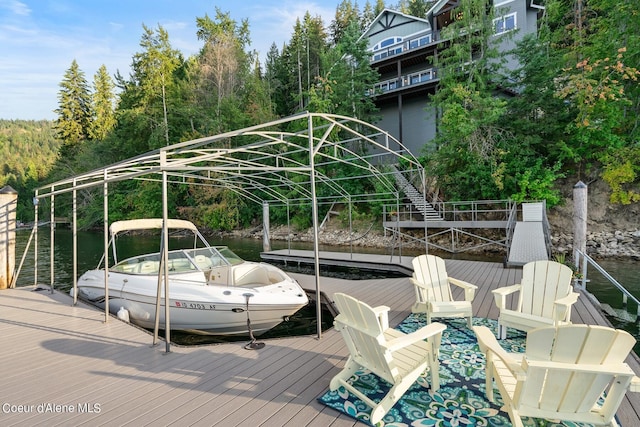 8491 N Mckinley Ln, Hayden, ID 83835 - view of dock featuring a water view