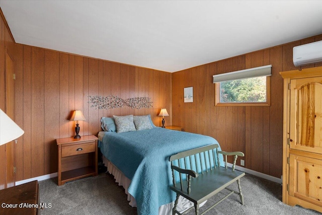 bedroom with carpet floors, a wall mounted air conditioner, and baseboards